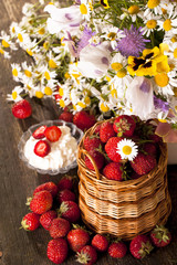 strawberries and bouquet of  flowers