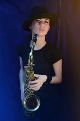 Saksofonistka - obrazy, fototapety, plakaty