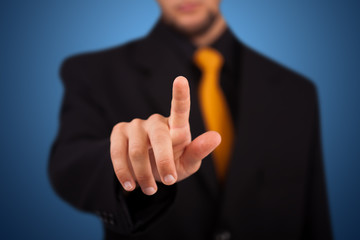 Businessman pressing an imaginary button