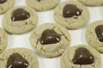 heart shaped chocolate on peanut butter cookies