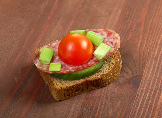 toasted crostini topped with Salami ,tomat