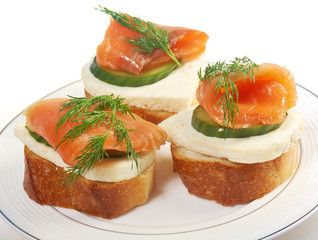 Canapes with smoked salmon  cheese and cucumber