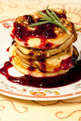 Tasty pancake with bilberry jam