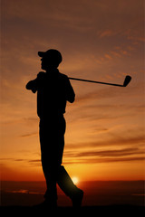 male golfer sunset