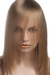 portrait of girl covering face with hair