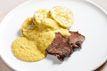 sirloin on cream with dumplings