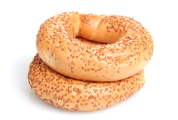delicious bagels with sesame seeds isolated on white