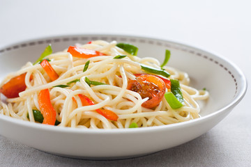 Spaghetti sautéed with vegetables