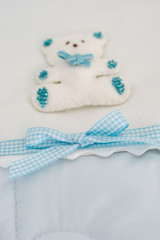 Teddy bear plush fabric background with staple