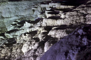 Illuminated travertine terraces in Pamukkale at night, Turkey