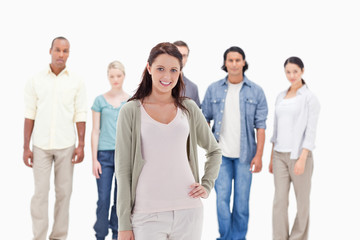 Fototapeta premium People behind a smiling woman