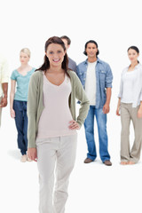 Obraz premium Close-up of people behind a smiling woman