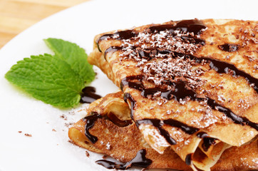 Crepes with chocolate sauce
