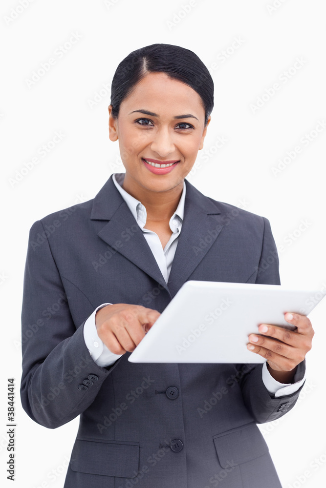 Poster Close up of saleswoman using touch screen computer
