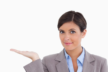 Close up of female entrepreneur presenting with palm up