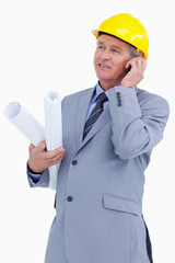 Mature architect on his cellphone