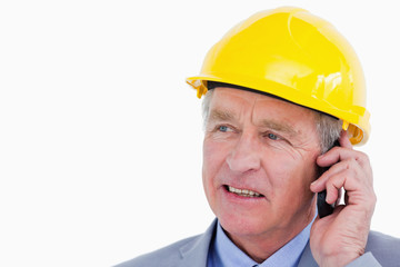 Close up of mature architect on the phone