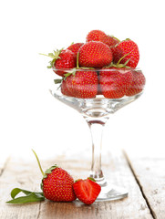 Glass bowl with strawberries