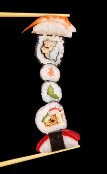Maxi sushi, isolated on black background
