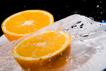 Orange with water splashes