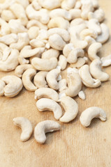 Cashews on wooden background