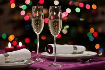 Christmas table setting with sparkling wine