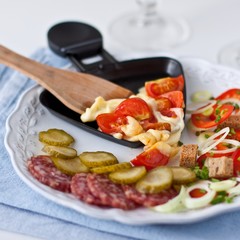 Raclette with salami