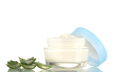 Opened glass jar of cream and aloe isolated on white