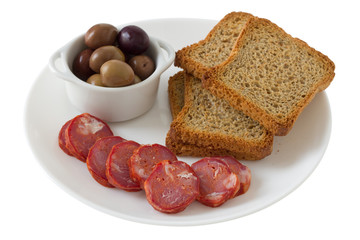 sausages with toasts and olives