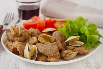 pork with seafood and salad