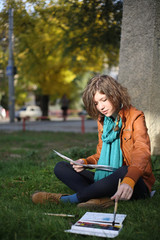 The artist draws in park