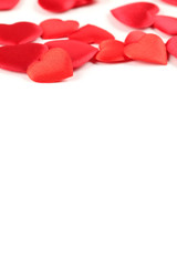 Border made of heart shaped decorations on white background