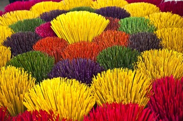 Fototapeta na wymiar Colourful incense sticks