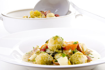 autumn vegetable stew with carrots and brussels sprouts