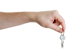 hand holding keys on a white background