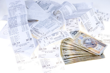 Money and receipts isolated on white background