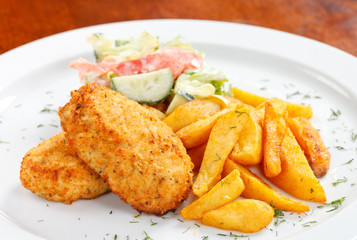 chicken cutlet with fried potatoes