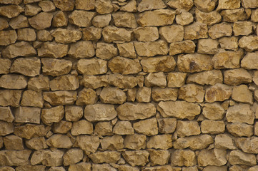 Yellow stone brick wall