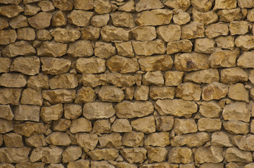 Yellow stone brick wall