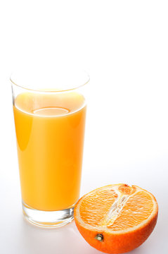 Orange juice and slice on white