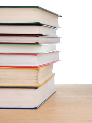 pile of old books isolated on white