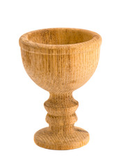 Turned wooden egg eating dish isolated on white