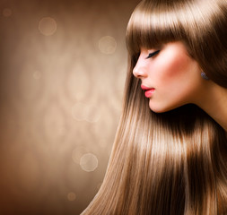 Blond Hair. Beautiful Woman with Straight Long Hair