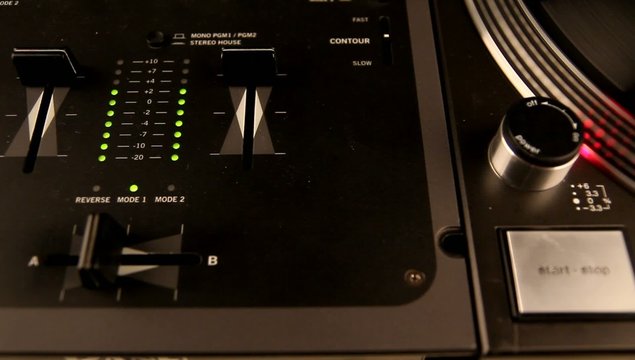 Dj mixer and spinning turntable