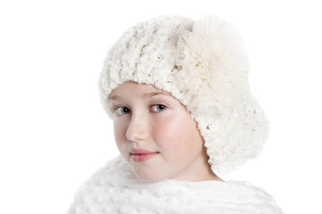 a girl in a white hat and shawl