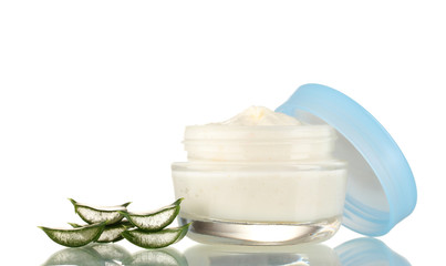 Opened glass jar of cream and aloe isolated on white