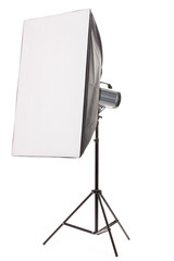 Studio flash with soft-box on white background