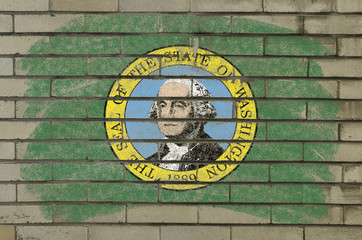 flag of US state of washington on brick wall painted with chalk