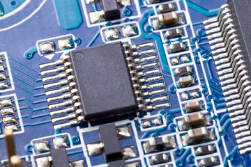 Micro chip on the computer motherboard close up