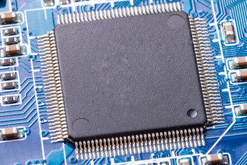 Micro chip on the computer motherboard close up